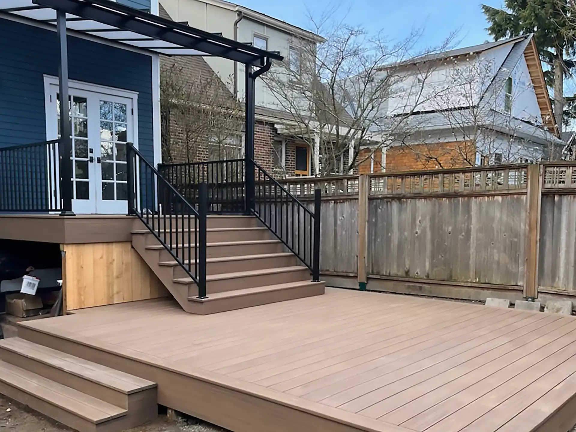 Experienced Deck Builder in St. Charles installing a new composite deck in Michigan